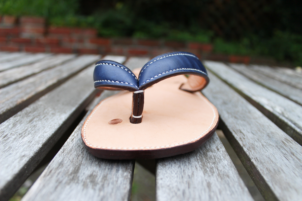 blue leather flip flops